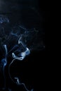 Abstract white blue smoke from aromatic sticks. Royalty Free Stock Photo