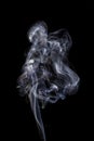 Abstract white blue smoke from aromatic sticks. Royalty Free Stock Photo