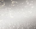 Abstract White Bokeh with soft blurred background nature blurry light party in vintage style warm pastel shimmering and faded cool Royalty Free Stock Photo