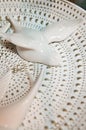 White ceramic bird on decorative plate decoration