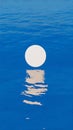 Abstract White Circle Reflecting on Blue Water Royalty Free Stock Photo