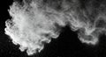 Abstract White Cloud of Powder Floating on Dark Background Royalty Free Stock Photo
