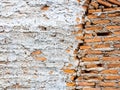Abstract white grunge peeling cement texture on brick wall background. Old crack plaster concrete wall. Royalty Free Stock Photo