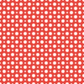 Abstract white polka dots isolated on a bright red geometric seamless pattern Royalty Free Stock Photo