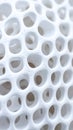 Abstract white porous structure with interconnected circular holes and textured surface Royalty Free Stock Photo