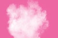 Abstract white powder explosion on pink background. Freeze motion of white dust splattered Royalty Free Stock Photo