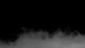 Abstract white puffs of smoke swirls overlay on black background Royalty Free Stock Photo