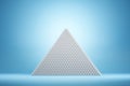 Abstract white pyramid on blue background Royalty Free Stock Photo