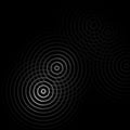 Abstract white rings sound light effect on black background Royalty Free Stock Photo