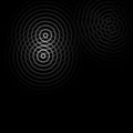 Abstract white rings sound waves effect on black background Royalty Free Stock Photo