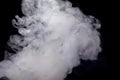 Abstract white smoke against dark background Royalty Free Stock Photo