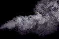 Abstract white smoke against dark background Royalty Free Stock Photo