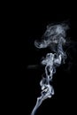 Abstract white smoke shape over black. Isolated Royalty Free Stock Photo