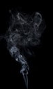 Abstract white smoke shape over black. Isolated Royalty Free Stock Photo