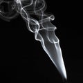 Abstract white smoke swirls pattern over the black background Royalty Free Stock Photo