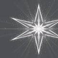 Abstract White Starburst Light Effect on Gray Background glowing Royalty Free Stock Photo