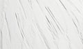 Abstract white texture with linear patterns and subtle depth variations, resembling snow or ice formations Royalty Free Stock Photo