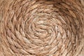 Abstract wicker seagrass basket texture background. Circle spiral pattern. Natural storage basket