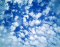 Abstract blue summer sky with white cirrus,cumulus,layered air clouds on beautiful sunny day.Banner,texture for design Royalty Free Stock Photo