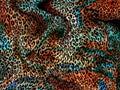 Abstract wild leopard skin fabric with grunge surface