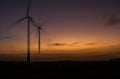Abstract wind farm on an African sunset turning to generate power Royalty Free Stock Photo