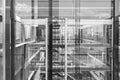 Abstract window reflections in morden office building. Black and white photo. Royalty Free Stock Photo