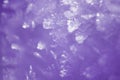 Abstract winter background with violet toning. Crystals of snow cover, macro Royalty Free Stock Photo