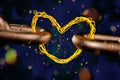 Abstract wiring of a hot coil in the form of a metal chain connected by a heart. Royalty Free Stock Photo