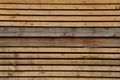 Abstract wood background. Unpainted natural wood surface from horizontal planks. Royalty Free Stock Photo