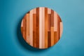 Abstract wood table texture on blue background, top view