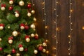 Abstract wooden background with christmas tree and lights, classic dark interior backdrop, copy space for text, winter holiday con Royalty Free Stock Photo