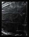 Abstract Wrinkled Clear Plastic Sheet on Black Backdrop Detailed Texture Royalty Free Stock Photo