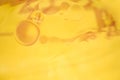 Abstract yellow background - oil in water Royalty Free Stock Photo