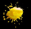 Abstract yellow blotch drops on a black background Royalty Free Stock Photo