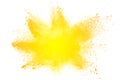 Abstract yellow dust explosion on white background. Royalty Free Stock Photo