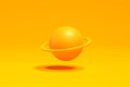 Abstract yellow geometric sphere levitating with an orbit. Planet, space or astronomy