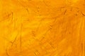 Abstract yellow golden grunge stucco wall backdrop Royalty Free Stock Photo