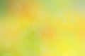 Abstract yellow, green, orange, background with blurred abstract spots and bokeh Royalty Free Stock Photo