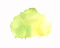 Abstract yellow and green splotch of watercolor paint on a white textured paper