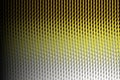 Abstract yellow and grey metallic grid pattern with a gradient effect Royalty Free Stock Photo