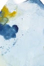 Abstract yellow and indigo blue watercolor paint on white paper background Royalty Free Stock Photo