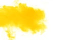 Abstract yellow orange powder explosion on white background. Freeze motion of yellow dust particles splash Royalty Free Stock Photo
