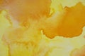 Abstract yellow and orange watercolour background