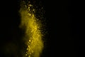 Abstract yellow powder splatted background,Freeze motion of colo Royalty Free Stock Photo