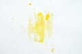 Abstract yellow watercolor splatters