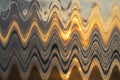 Abstract zigzag pattern with waves on nature theme. Artistic image processing created by photo of rising sun.