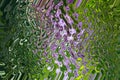 Abstract zigzag pattern with waves in purple and green tones. Artistic image processing created by flowering purple wisteria photo