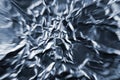 Abstract zoom tunnel crumpled silver aluminum foil closeup background texture, blue horizontal textured pattern Royalty Free Stock Photo