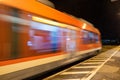 Abstraction - the train moves quickly along the platform Royalty Free Stock Photo