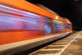 Abstraction - the train moves quickly along the platform Royalty Free Stock Photo